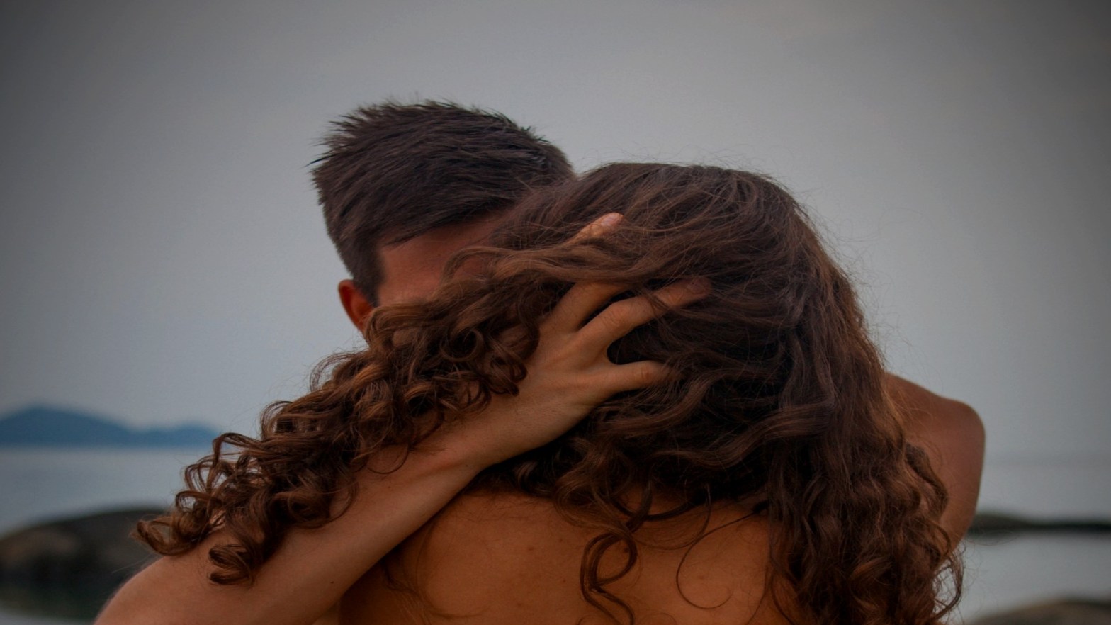 Naked people kissing