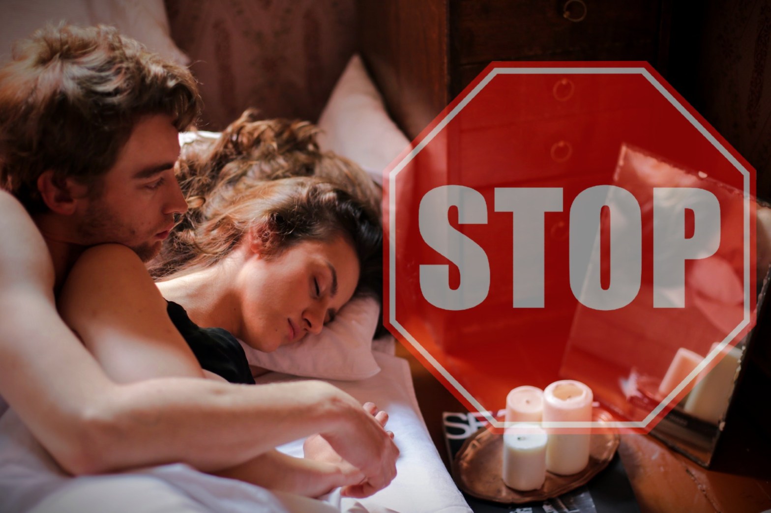 Man and woman laying on bed