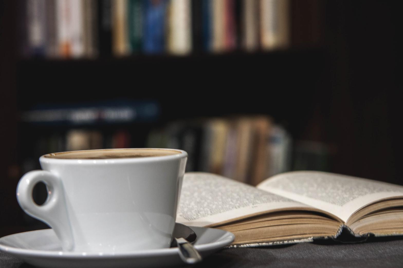 A cup of coffee and a book